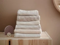 Mushie honeycomb beige strikket babytæppe